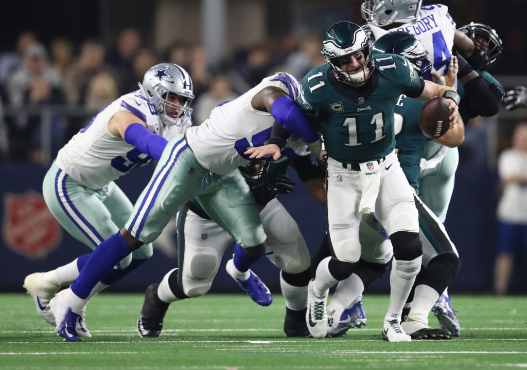 DeMarcus Lawrence and Carson Wentz