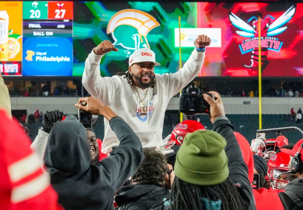 Delaware State head coach DeSean Jackson is carried on the field after the Hornets’ 27-20 win against Norfolk State at Lincoln Financial Field in Philadelphia, Oct. 30, 2025.