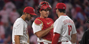 Aug 18, 2025; Philadelphia, Pennsylvania, USA; Philadelphia Phillies shortstop Trea Turner (7), catcher J.T. Realmuto (10) and outfielder Kyle Schwarber (12) celebrate win against the Seattle Mariners at Citizens Bank Park.