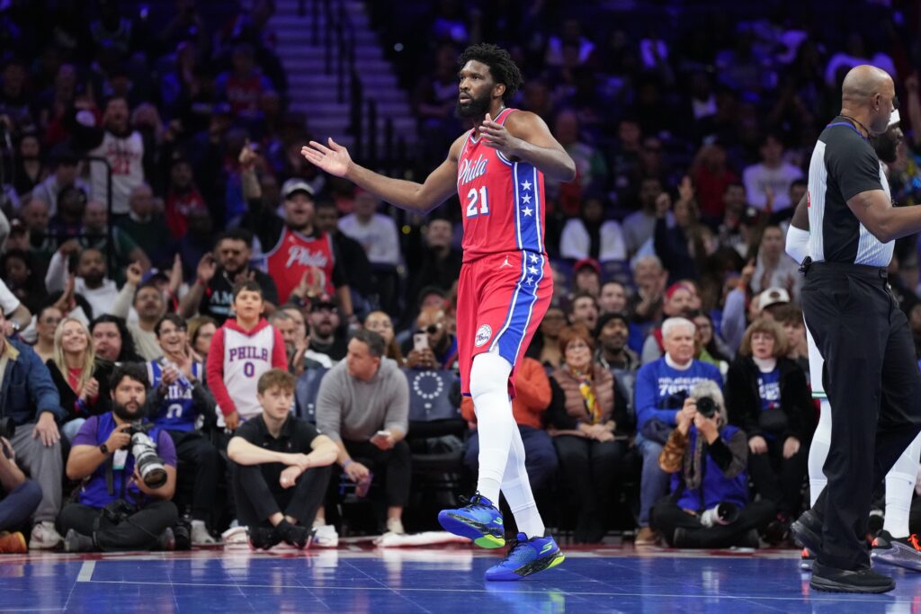 Oct 31, 2025; Philadelphia, Pennsylvania, USA; Philadelphia 76ers center Joel Embiid (21) reacts against the Boston Celtics in the first quarter at Xfinity Mobile Arena.