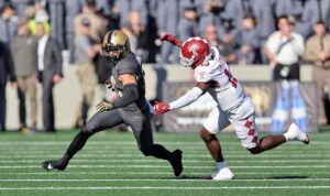 Nov 8, 2025; West Point, New York, USA; Army Black Knights running back Noah Short (15) runs with the ball against the Temple Owls during the first half at Michie Stadium.