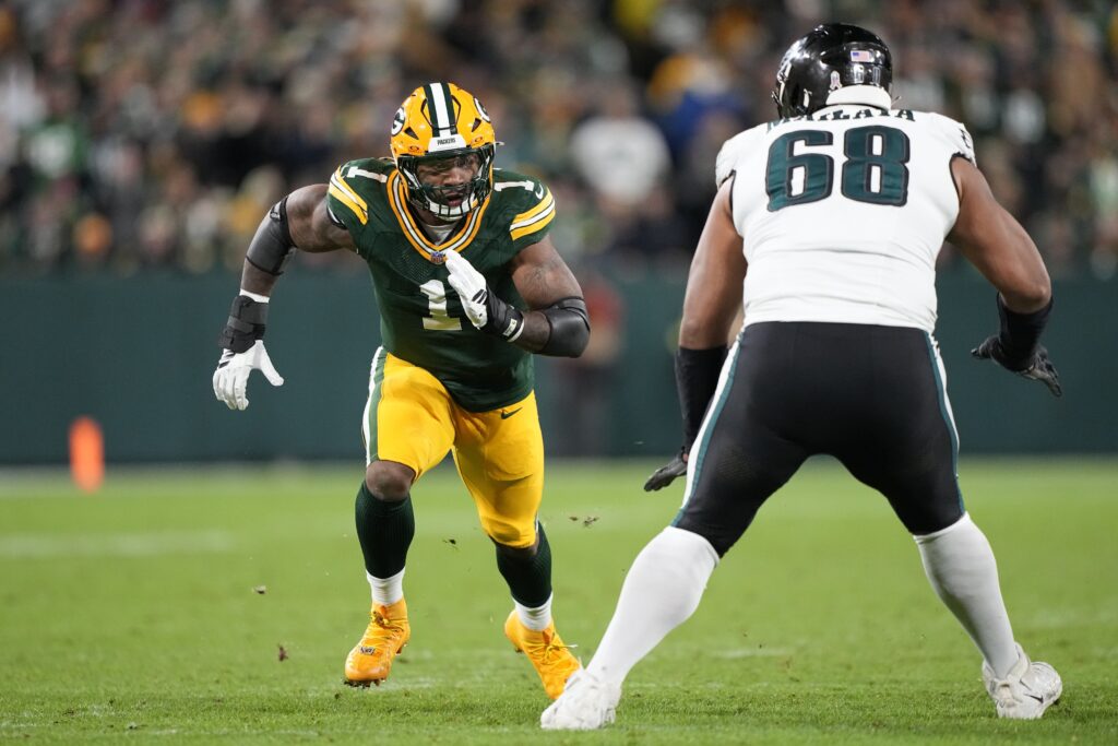 Nov 10, 2025; Green Bay, Wisconsin, USA; Green Bay Packers defensive end Micah Parsons (1) in action against Philadelphia Eagles offensive tackle Jordan Mailata (68) in the second half at Lambeau Field.