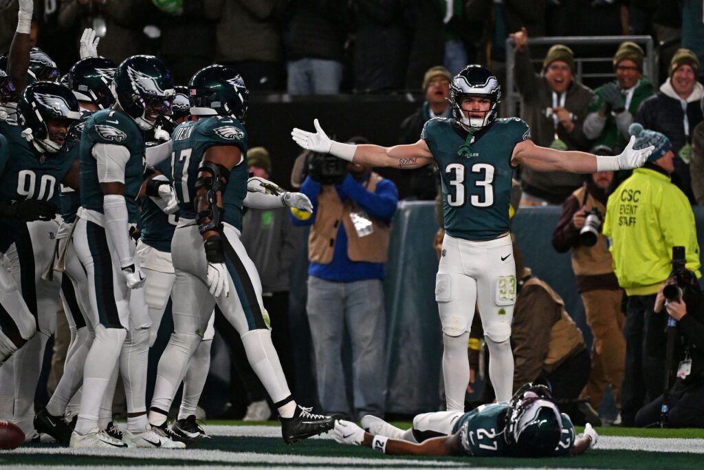 Nov 16, 2025; Philadelphia, Pennsylvania, USA; Philadelphia Eagles cornerback Cooper DeJean (33) reacts after making an interception against the Detroit Lions during the first half at Lincoln Financial Field.
