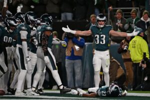 Nov 16, 2025; Philadelphia, Pennsylvania, USA; Philadelphia Eagles cornerback Cooper DeJean (33) reacts after making an interception against the Detroit Lions during the first half at Lincoln Financial Field.