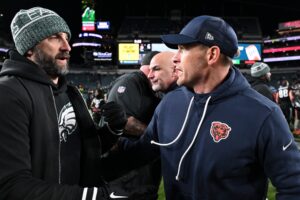 Nov 28, 2025; Philadelphia, Pennsylvania, USA; Philadelphia Eagles head coach Nick Sirianni speaks with Chicago Bears head coach Ben Johnson after the game at Lincoln Financial Field.