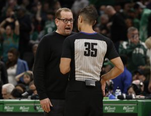 Apr 7, 2023; Boston, Massachusetts, USA; Toronto Raptors head coach Nick Nurse talks with referee Jason Goldenberg (35) during the second half of their loss to the Boston Celtics at TD Garden.