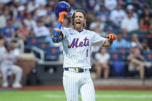 Aug 12, 2025; New York City, New York, USA; New York Mets second baseman Jeff McNeil (1) reacts after lining out in the second inning against the Atlanta Braves at Citi Field.