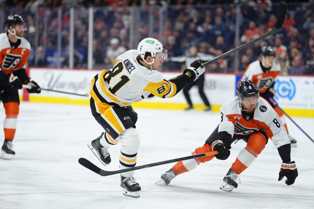 Dec 1, 2025; Philadelphia, Pennsylvania, USA; Pittsburgh Penguins center Ben Kindel (81) shoots the puck against the Philadelphia Flyers in the second period at