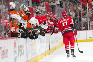 Dec 14, 2025; Raleigh, North Carolina, USA; Carolina Hurricanes right wing Andrei Svechnikov (37) celebrates after scoring the game winner in the shootout against the Philadelphia Flyers at Lenovo Center.