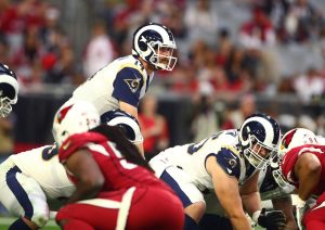 Dec 23, 2018; Glendale, AZ, USA; Los Angeles Rams quarterback Sean Mannion (14) against the Arizona Cardinals at State Farm Stadium.