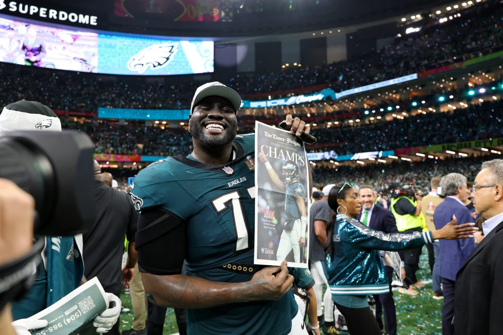 Feb 9, 2025; New Orleans, LA, USA; Philadelphia Eagles offensive tackle Mekhi Becton (77) celebrates after winning Super Bowl LIX at Caesars Superdome.