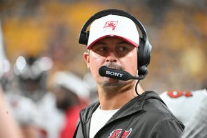 Aug 16, 2025; Pittsburgh, Pennsylvania, USA; Tampa Bay Buccaneers offensive coordinator Josh Grizzard watches the action against the Pittsburgh Steelers during the second half at Acrisure Stadium.
