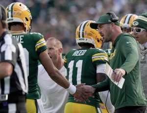 Green Bay Packers quarterback coach Sean Mannion is shown congratulating quarterback Jordan Love (10) during the second quarter of their game Sunday, September 7, 2025 at Lambeau Field in Green Bay, Wisconsin. The Green Bay Packers beat the Detroit Lions 27-13.Green Bay Packers quarterback coach Sean Mannion is shown congratulating quarterback Jordan Love (10) during the second quarter of their game Sunday, September 7, 2025 at Lambeau Field in Green Bay, Wisconsin. The Green Bay Packers beat the Detroit Lions 27-13.