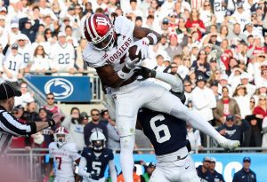 Nov 8, 2025; University Park, Pennsylvania, USA; Indiana Hoosiers wide receiver Omar Cooper Jr. (3) makes a catch in the end zone for a touchdown during the fourth quarter against the Penn State Nittany Lions at Beaver Stadium.