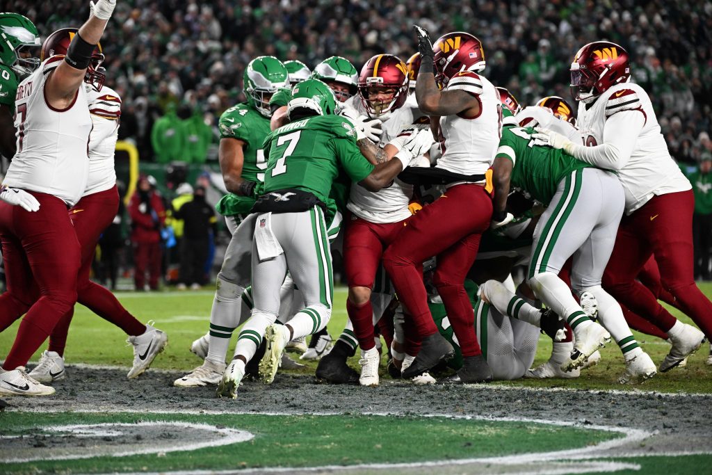 Jan 4, 2026; Philadelphia, Pennsylvania, USA; Washington Commanders running back Chris Rodriguez Jr. (36) scores a touchdown during the second quarter against the Philadelphia Eagles at Lincoln Financial Field.