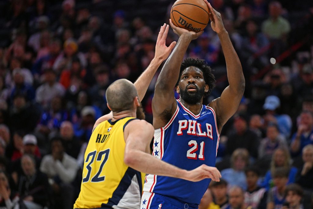 Jan 19, 2026; Philadelphia, Pennsylvania, USA; Philadelphia 76ers center Joel Embiid (21) shoots over Indiana Pacers center Jay Huff (32) during the first quarter at Xfinity Mobile Arena.