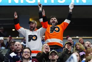 Jan 23, 2026; Denver, Colorado, USA; Philadelphia Flyers fans celebrate during the third period against the Colorado Avalanche at Ball Arena. Mandatory Credit: