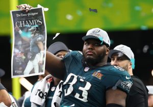 Feb 9, 2025; New Orleans, LA, USA; Philadelphia Eagles defensive tackle Milton Williams (93) celebrates on the podium after defeating the Kansas City Chiefs in Super Bowl LIX at Ceasars Superdome.