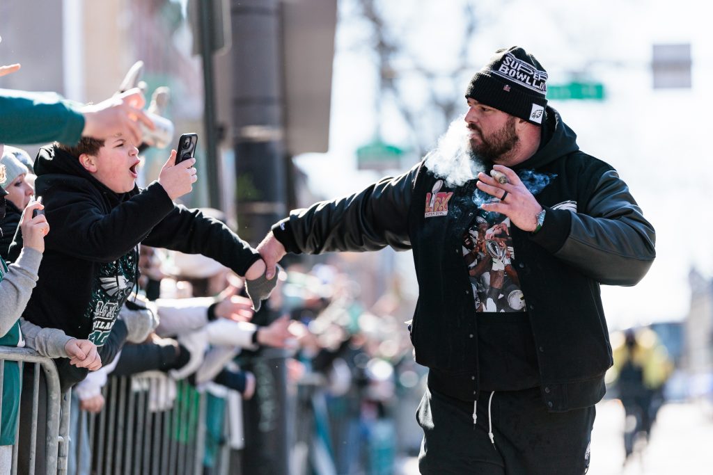 Feb 14, 2025; Philadelphia, PA, USA; Philadelphia Eagles guard Landon Dickerson (69) celebrates during the Super Bowl LIX championship parade and rally.