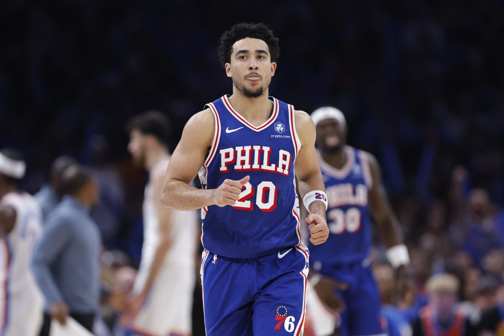 Dec 28, 2025; Oklahoma City, Oklahoma, USA; Philadelphia 76ers guard Jared McCain (20) runs down the court during a timeout against the Oklahoma City Thunder during the second half at Paycom Center.