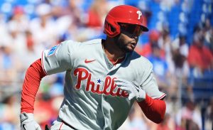 Feb 21, 2026; Dunedin, Florida, USA; Philadelphia Phillies outfielder Justin Crawford (80) doubles during the first inning against the Toronto Blue Jays at TD Ballpark.