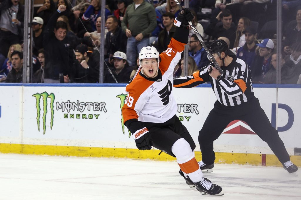 Feb 26, 2026; New York, New York, USA; Philadelphia Flyers right wing Matvei Michkov (39) celebrates after scoring a the game winning goal in overtime against the New York Rangers at Madison Square Garden.