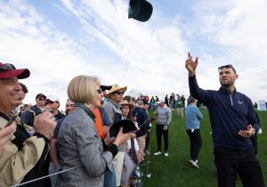 Former Coyote Paul Bissonnette tosses hats to fans on the 10th tee box during the Waste Management Phoenix Open Annexus Pro-Am at TPC Scottsdale Stadium Course. Bissonnette was Doan's caddie. Annexus Pro Am
