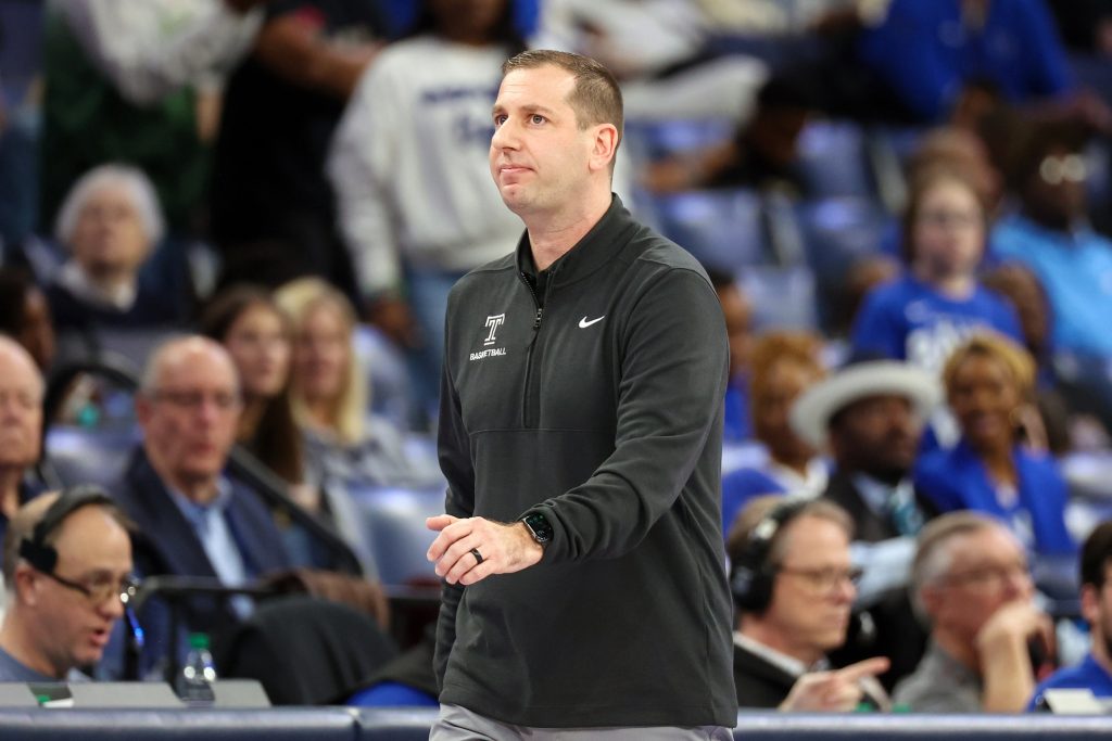 Feb 9, 2025; Memphis, Tennessee, USA; Temple Owls head coach Adam Fisher looks on against the Memphis Tigers during the first half at FedExForum.