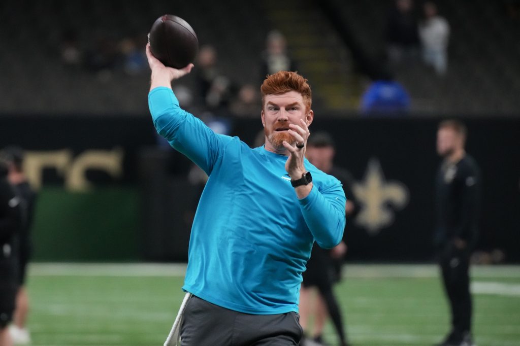 Dec 14, 2025; New Orleans, Louisiana, USA; Carolina Panthers quarterback Andy Dalton (14) warms up before the game against the New Orleans Saints at Caesars Superdome.