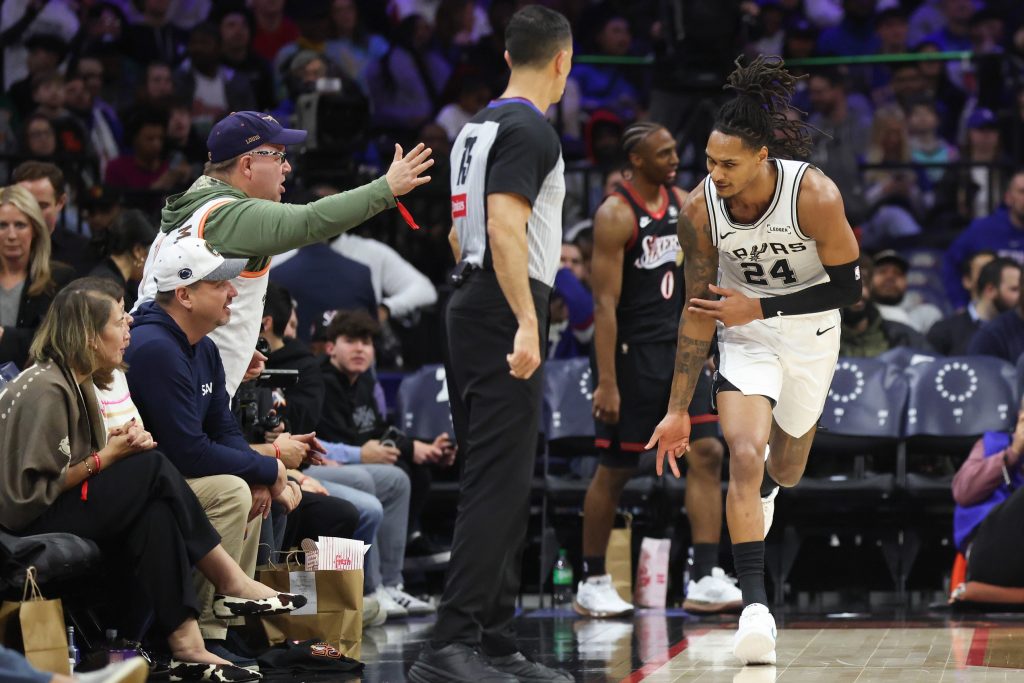 Mar 3, 2026; Philadelphia, Pennsylvania, USA; San Antonio Spurs guard Devin Vassell (24) reacts to his three pointer against the Philadelphia 76ers during the third quarter at Xfinity Mobile Arena.