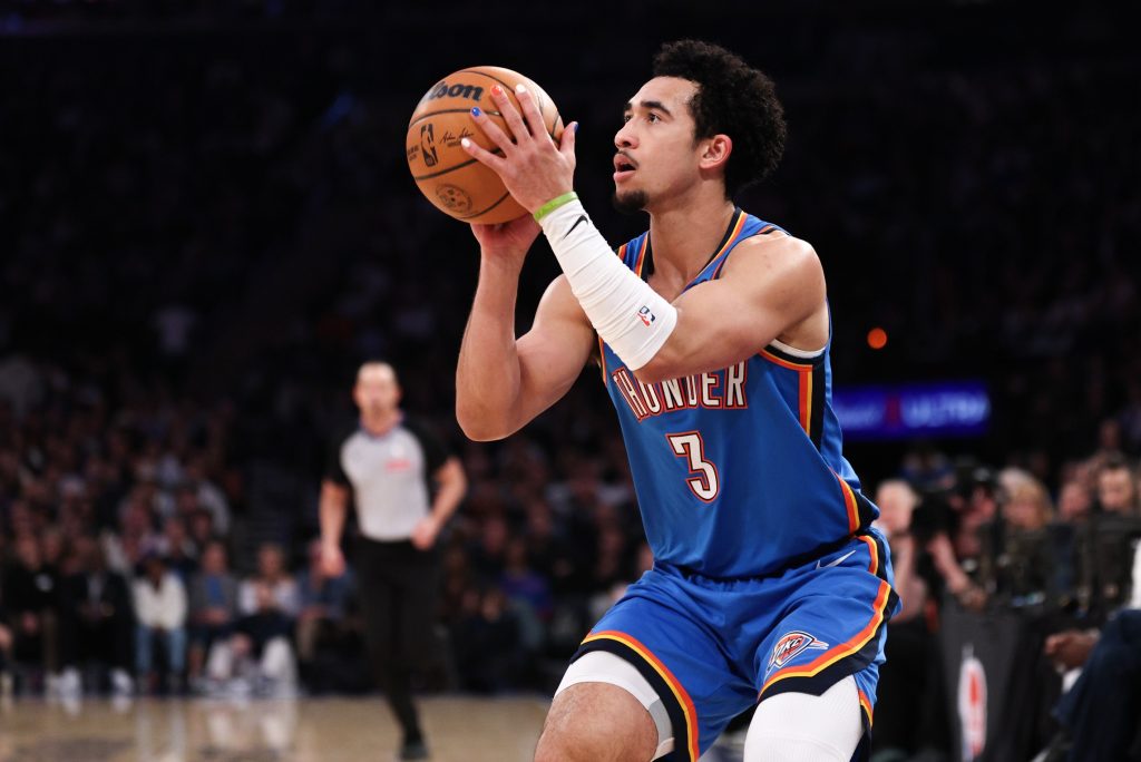 Mar 4, 2026; New York, New York, USA; Oklahoma City Thunder guard Jared McCain (3) shoots the ball against the New York Knicks during the first half at Madison Square Garden.