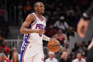 Mar 7, 2026; Atlanta, Georgia, USA; Philadelphia 76ers guard Tyrese Maxey (0) brings the ball up the court against the Atlanta Hawks during the first half at State Farm Arena.