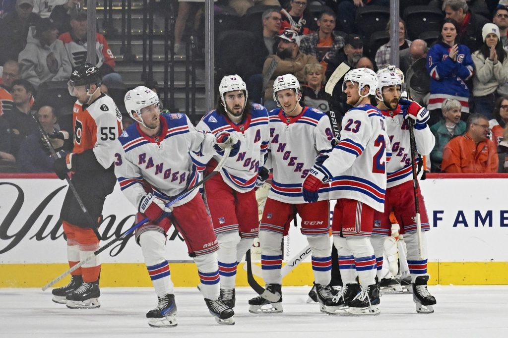 Mar 9, 2026; Philadelphia, Pennsylvania, USA; New York Rangers left wing Alexis Lafrenire (13) skates back to the bench after scoring a goal against the Philadelphia Flyers during the first period at Xfinity Mobile Arena.