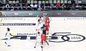 Mar 15, 2026; Pittsburgh, PA, USA; VCU Rams forward Lazar Djokovic (17) and Dayton Flyers forward Amael L'etang (29) take the opening tip-off in the Atlantic 10 Conference Tournament Championship game at PPG Paints Arena.