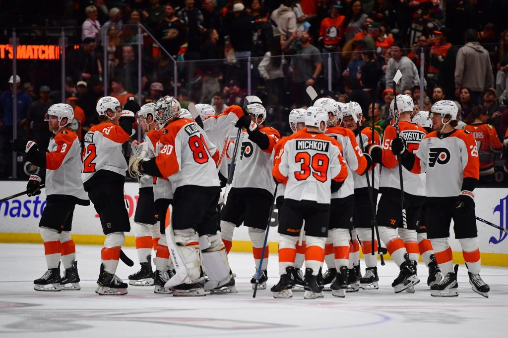 Mar 18, 2026; Anaheim, California, USA; Philadelphia Flyers celebrate the goal scored by left wing Noah Cates (27) against the Anaheim Ducks for the overtime victory at Honda Center.