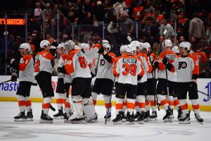 Mar 18, 2026; Anaheim, California, USA; Philadelphia Flyers celebrate the goal scored by left wing Noah Cates (27) against the Anaheim Ducks for the overtime victory at Honda Center.