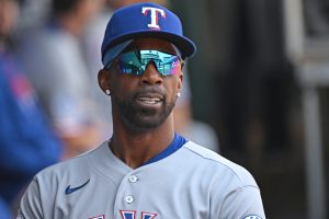 Mar 29, 2026; Philadelphia, Pennsylvania, USA; Texas Rangers outfielder Andrew McCutchen (4) in the dugout before game against the Philadelphia Phillies at Citizens Bank Park.