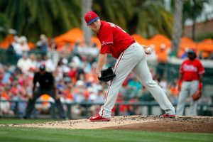 Mar 13, 2017; Sarasota, FL, USA; Philadelphia Phillies starting pitcher Jeremy Hellickson (58) looks back while on the mound against the Baltimore Orioles at Ed Smith Stadium.