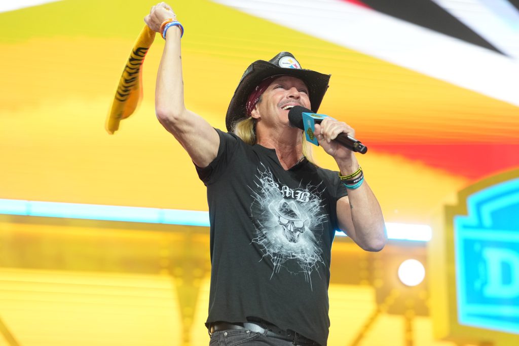 Apr 23, 2026; Pittsburgh, PA, USA; Bret Michaels holds a Terrible Towel during the 2026 NFL Draft at Acrisure Stadium.