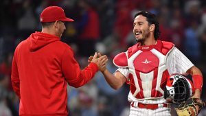 Sep 27, 2023; Philadelphia, Pennsylvania, USA; Philadelphia Phillies catcher Garrett Stubbs (21) and catcher J.T. Realmuto (10) celebrate finally out in win against the Pittsburgh Pirates at Citizens Bank Park.