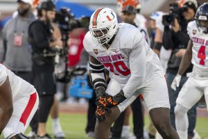 Jan 28, 2026; Mobile, AL, USA; American Team offensive lineman Markel Bell (70) of Miami lines up during American Senior Bowl practice at Hancock Whitney Stadium.