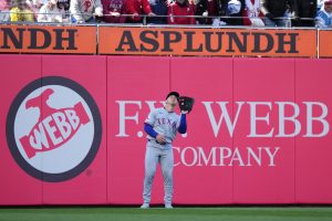 Mar 28, 2026; Philadelphia, Pennsylvania, USA; Texas Rangers outfielder Wyatt Langford (36) fields a fly ball against the Philadelphia Phillies in the third inning at Citizens Bank Park.