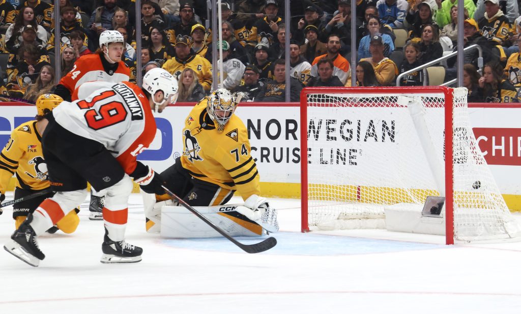 Apr 20, 2026; Pittsburgh, Pennsylvania, USA; Philadelphia Flyers right wing Garnet Hathaway (19) scores short-handed goal against Pittsburgh Penguins goaltender Stuart Skinner (74) during the second period in game two of the first round of the 2026 Stanley Cup Playoffs at PPG Paints Arena.