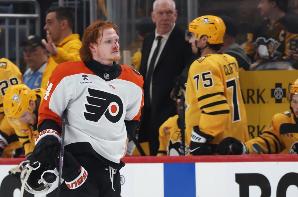 Apr 20, 2026; Pittsburgh, Pennsylvania, USA; Philadelphia Flyers right wing Owen Tippett (74) leaves the ice with a bloody nose after a scrum against the Pittsburgh Penguins during the third period in game two of the first round of the 2026 Stanley Cup Playoffs at PPG Paints Arena.