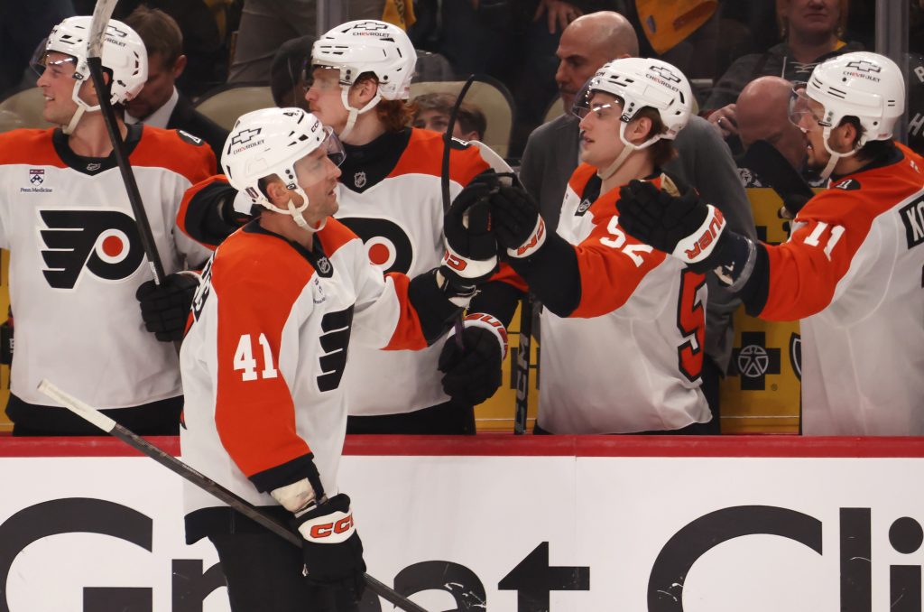 Apr 20, 2026; Pittsburgh, Pennsylvania, USA; Philadelphia Flyers center Luke Glendening (41) celebrates his empty net goal with the Flyers bench against the Pittsburgh Penguins during the third period in game two of the first round of the 2026 Stanley Cup Playoffs at PPG Paints Arena.