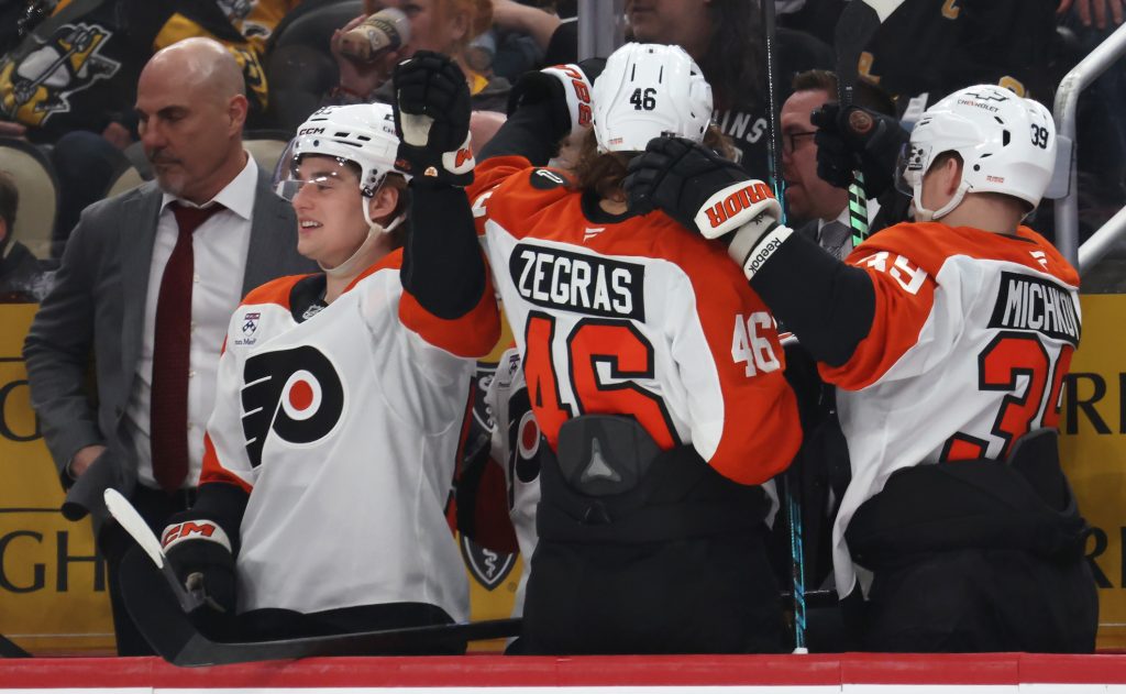 Apr 20, 2026; Pittsburgh, Pennsylvania, USA; The Philadelphia Flyers bench celebrates an empty net goal against the Pittsburgh Penguins during the third period in game two of the first round of the 2026 Stanley Cup Playoffs at PPG Paints Arena.