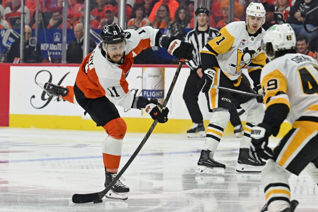 Apr 25, 2026; Philadelphia, Pennsylvania, USA; Philadelphia Flyers right wing Travis Konecny (11) takes a shot on goal against the Pittsburgh Penguins during the third period in game four of the first round of the 2026 Stanley Cup Playoffs at Xfinity Mobile Arena.