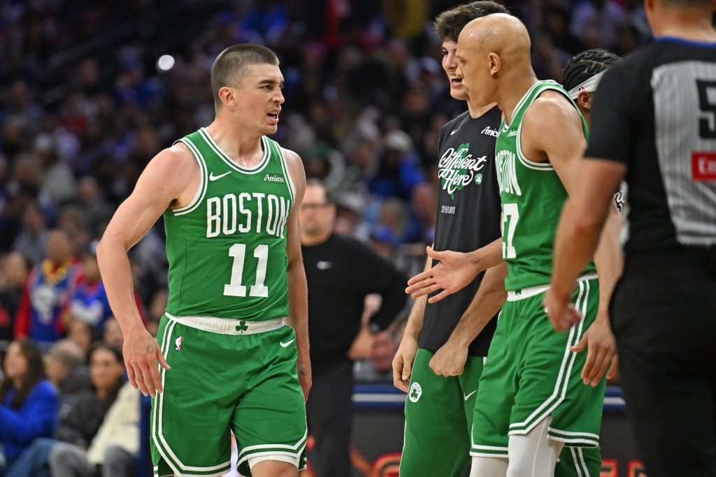Apr 26, 2026; Philadelphia, Pennsylvania, USA; Boston Celtics guard Payton Pritchard (11) reacts after making a three point basket before the buzzer at the end of the first quarter against the Philadelphia 76ers at Xfinity Mobile Arena.