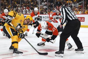 Apr 27, 2026; Pittsburgh, Pennsylvania, USA; Pittsburgh Penguins center Sidney Crosby (87) and Philadelphia Flyers left wing Noah Cates (27) take a third period face-off in game five of the first round of the 2026 Stanley Cup Playoffs at PPG Paints Arena.