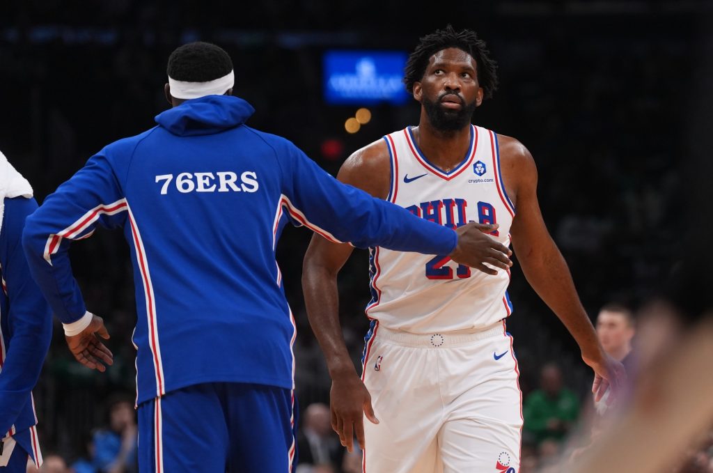 Apr 28, 2026; Boston, Massachusetts, USA; Philadelphia 76ers center Joel Embiid (21) checks the board during a break against the Boston Celtics in the first quarter during game five of the first round of the 2026 NBA Playoffs at TD Garden.